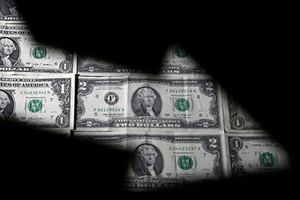 Мир, завёрнутый в зелёную бумажку. Когда рухнет доллар?